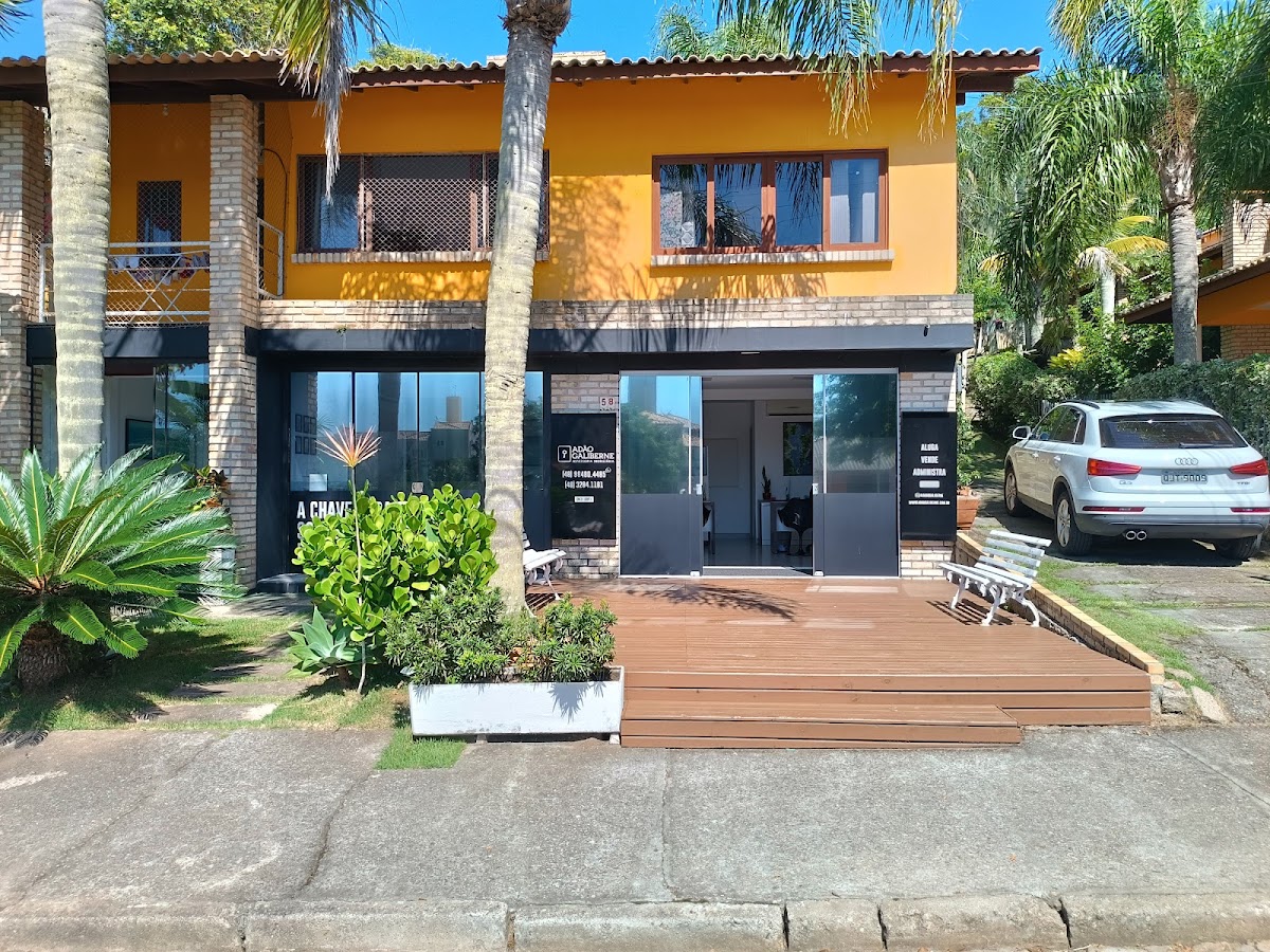 Logo Adão Galiberne Assessoria Imobiliaria
