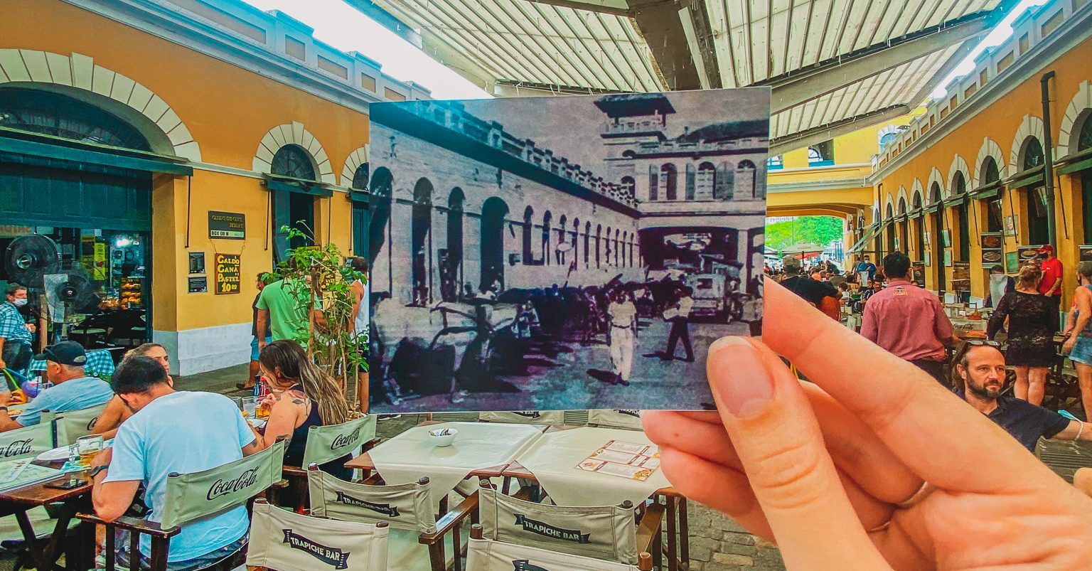 Interior do Mercado Público de Florianópolis com mesas sob a cobertura