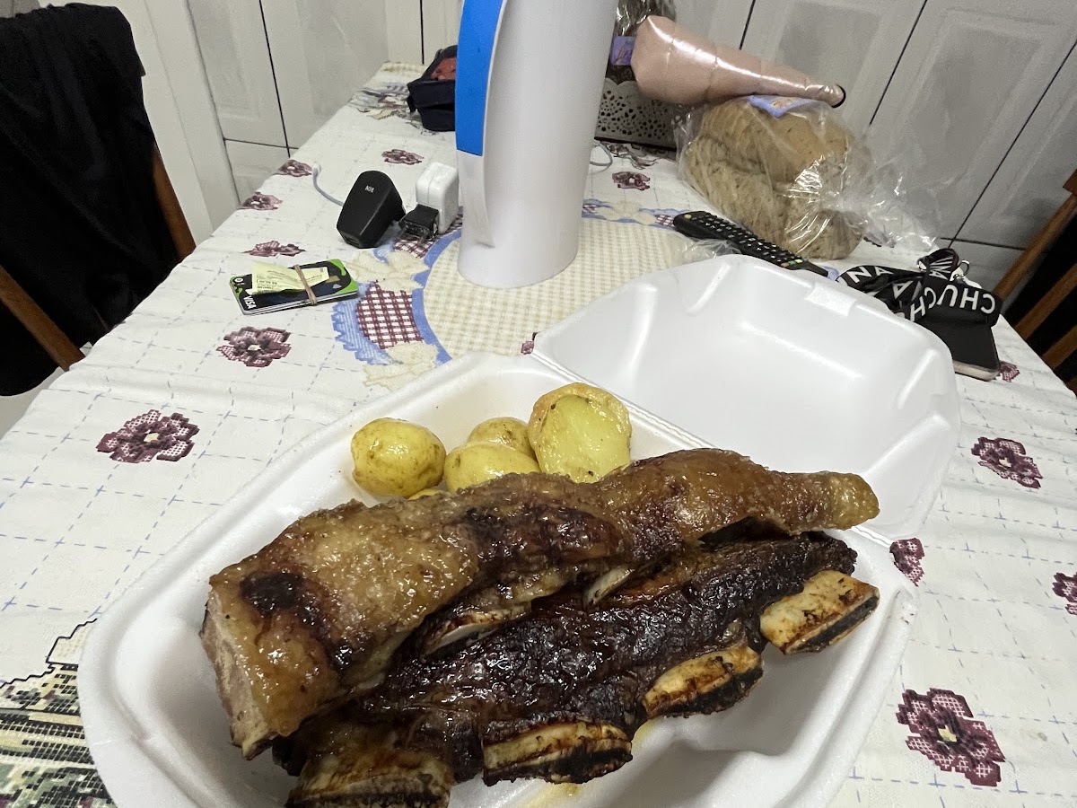 Logo Frango Assado do Tom