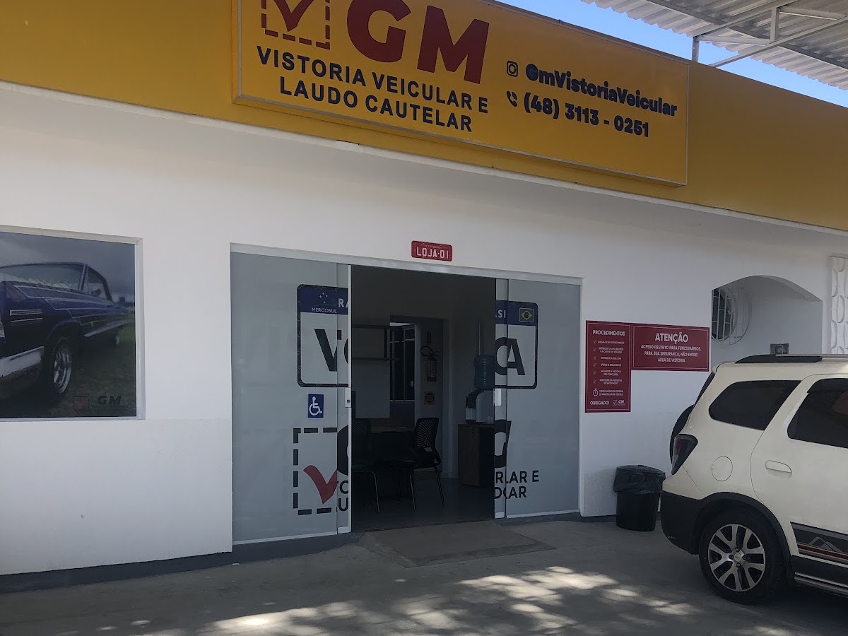 Logo GM vistoria veicular e laudo cautelar.
