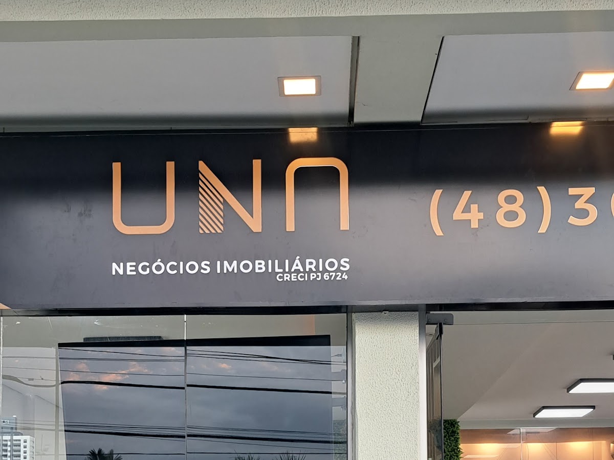 Logo UNA Negócios Imobiliários - Imobiliária em Florianópolis